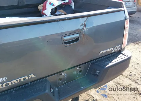 2011 Honda Ridgeline Rtl z USA, uszkodzony, nr VIN 5FPYK1F55BB004059